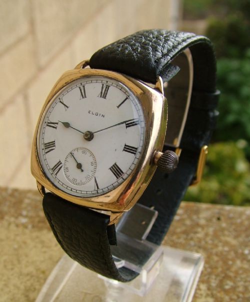 An Antique Elgin Gents Cushion Cased Wrist Watch