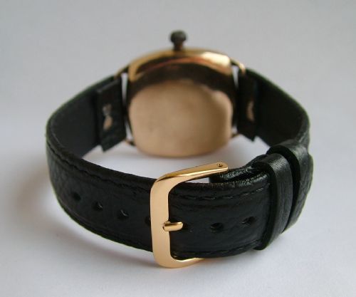 fig 2. An antique Elgin gents cushion cased wrist watch
