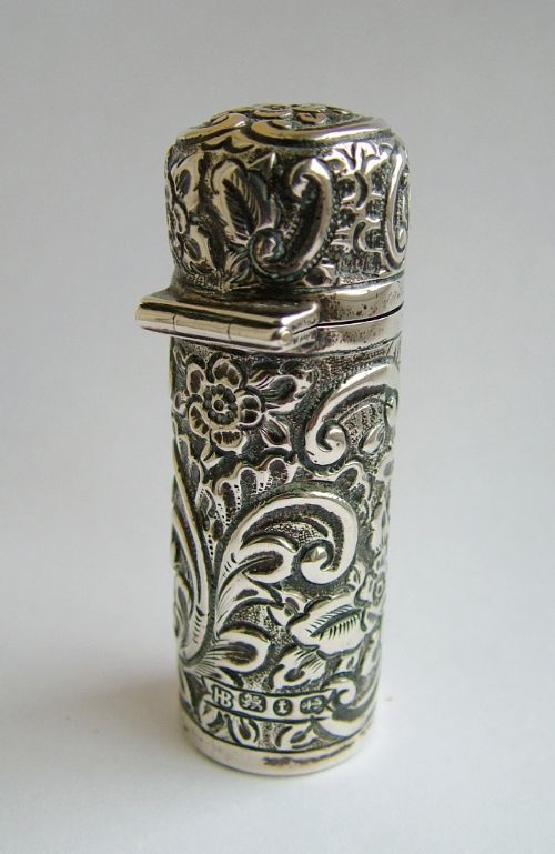 fig 1. Antique English sterling silver repoussé scent bottle