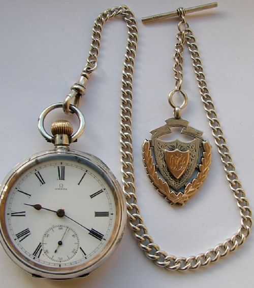 fig 1. Antique silver Omega pocket watch, chain and fob
