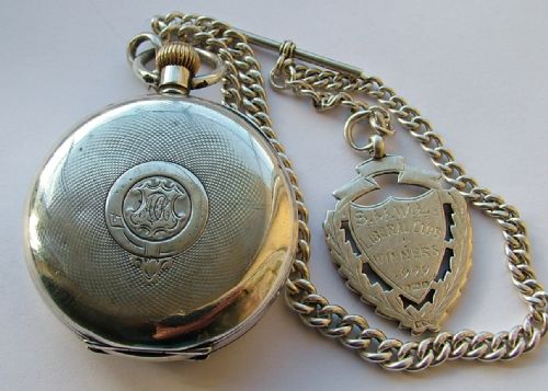 fig 2. Antique silver Omega pocket watch, chain and fob