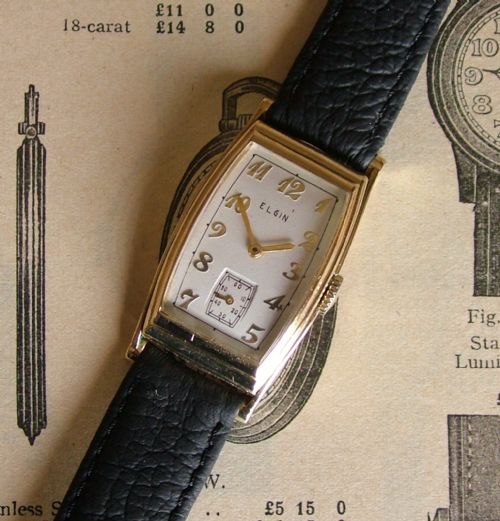 fig 1. A vintage Gents 1938 Elgin 10K gold filled curvex wrist watch.