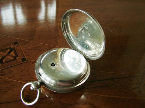 fig 1. An antique silver H Samuel pocket watch