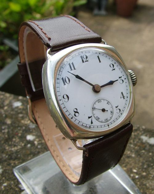 fig 1. A gents 1930s silver cushion cased wristwatch