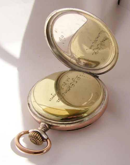 fig 2. An antique galonne cased pocket watch, circa 1910s.