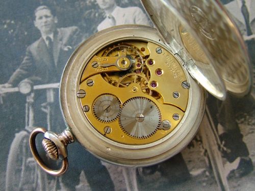 fig 1. A 1950s Longines pocket watch