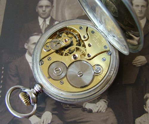fig 2. An antique silver Zenith pocket watch