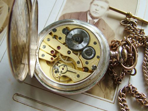 fig 2. A 1920s Phenix Superior pocket watch and chain