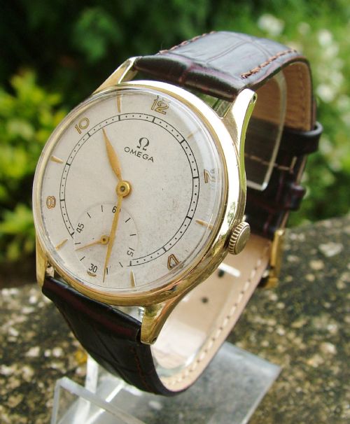 A Gents 1940s 9 Carat Gold Omega Wrist Watch