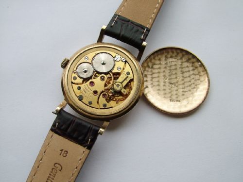 fig 2. A 9ct gold gents Longines wrist watch, 1950