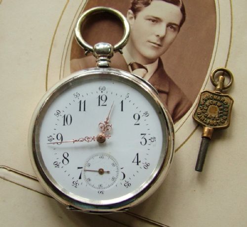 fig 1. Antique silver pocket watch, Swedish coat of Arms