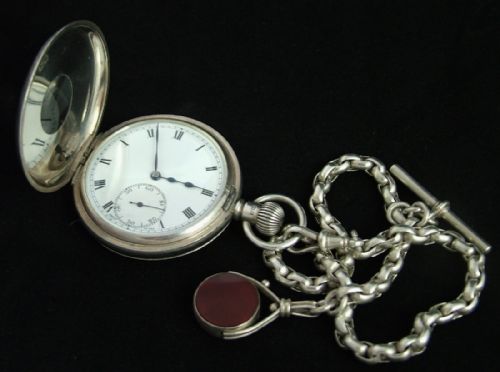 fig 1. Silver half hunter pocket watch, chain and swivel