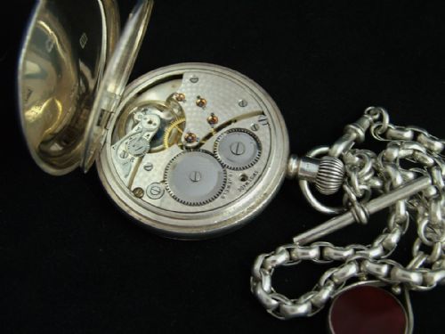 fig 2. Silver half hunter pocket watch, chain and swivel