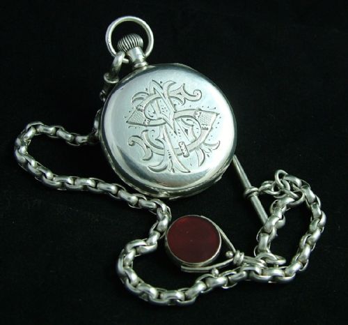 fig 3. Silver half hunter pocket watch, chain and swivel