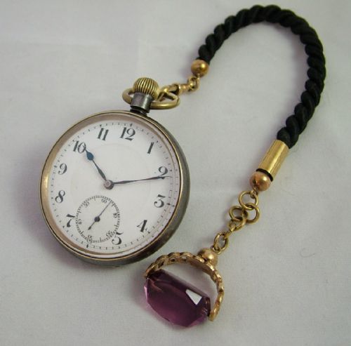 fig 1. Antique gun metal cased pocket watch and albert