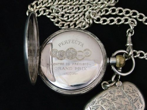 fig 2. Silver Perfecta pocket watch, albert and vesta