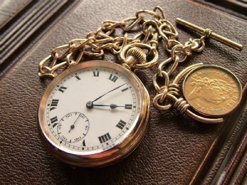 A 1920s Record Pocket Watch, Chain and Fob