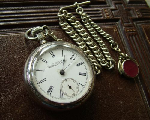 An Antique Waltham Sterling Pocket Watch and Chain