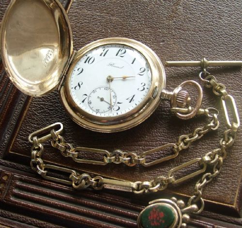 fig 1. A 1930s Record full hunter pocket watch and chain