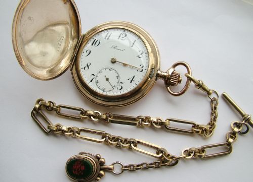 A 1930s Record Full Hunter Pocket Watch and Chain