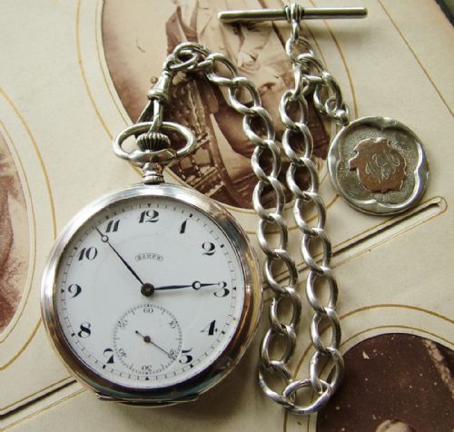 fig 1. A 1920s Thommen pocket watch and chain