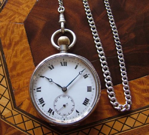 fig 1. A World War 1 era silver pocket watch and chain