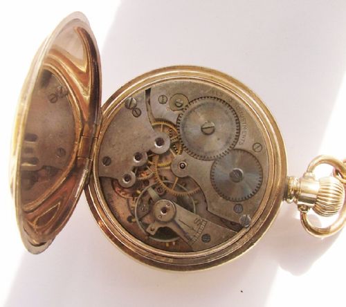 fig 1. A vintage 1920s Cyma gold plated pocket watch, chain & swivel