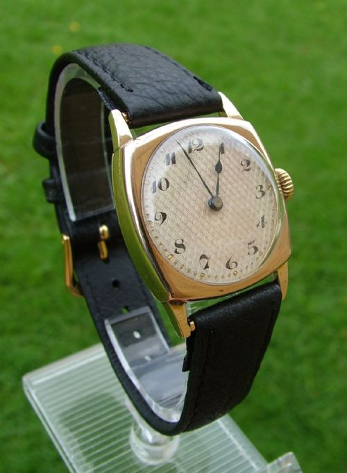 fig 1. A 1926 9 carat gold mid-size wrist watch