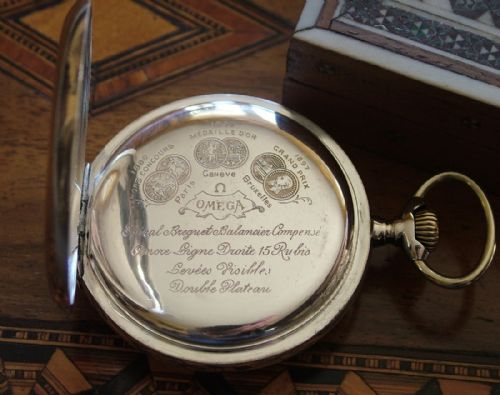 fig 1. An antique silver Omega pocket watch