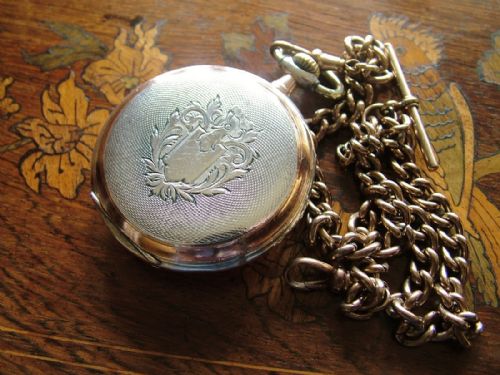fig 2. Antique galonne cased Omega pocket watch and chain