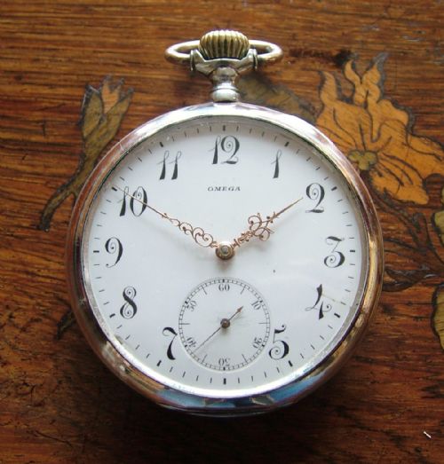 fig 1. An antique galonne cased Omega pocket watch