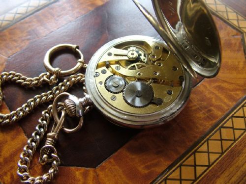 fig 1. A 1920s Polhem pocket watch and chain