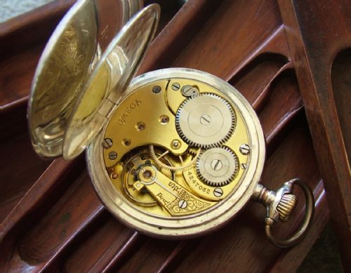 fig 1. An antique silver Omega pocket watch