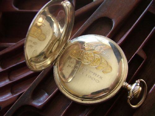 fig 2. An antique silver Omega pocket watch