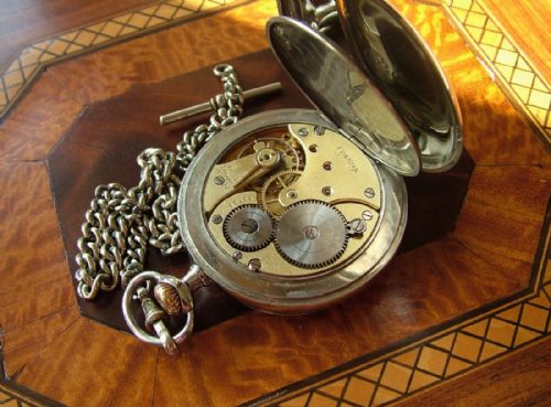 fig 1. A 1920s Omega pocket watch and chain