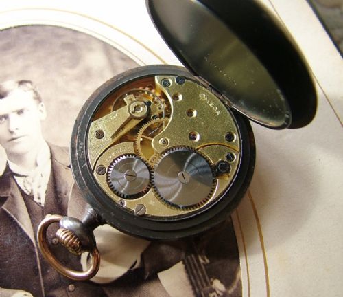 fig 1. A 1920s Omega gun metal cased pocket watch