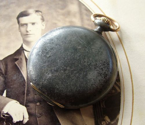 fig 2. A 1920s Omega gun metal cased pocket watch