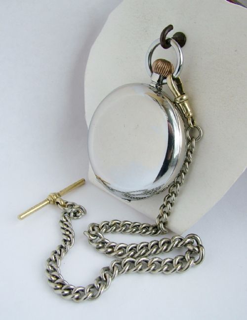 fig 1. An antique Omega pocket watch & chain