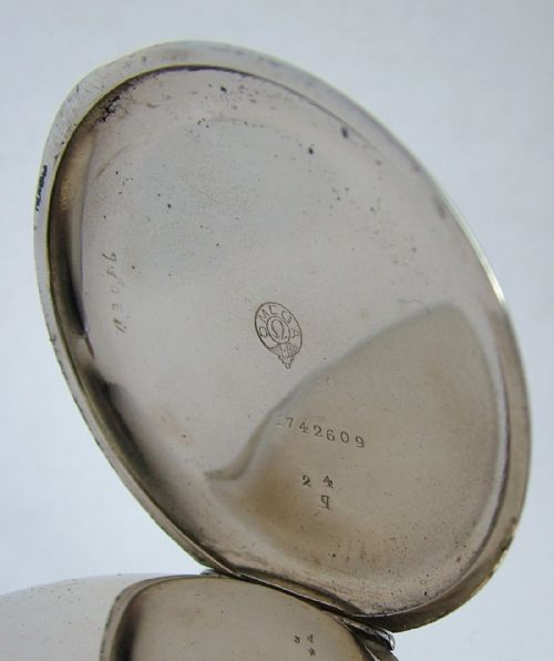 fig 2. An antique Omega pocket watch & chain
