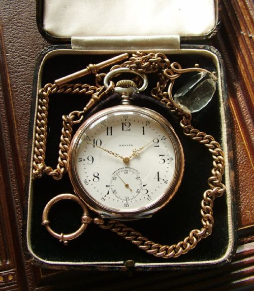 fig 1. An antique Zenith pocket watch, chain and box