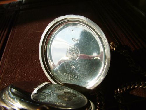 fig 2. An antique Zenith pocket watch, chain and box
