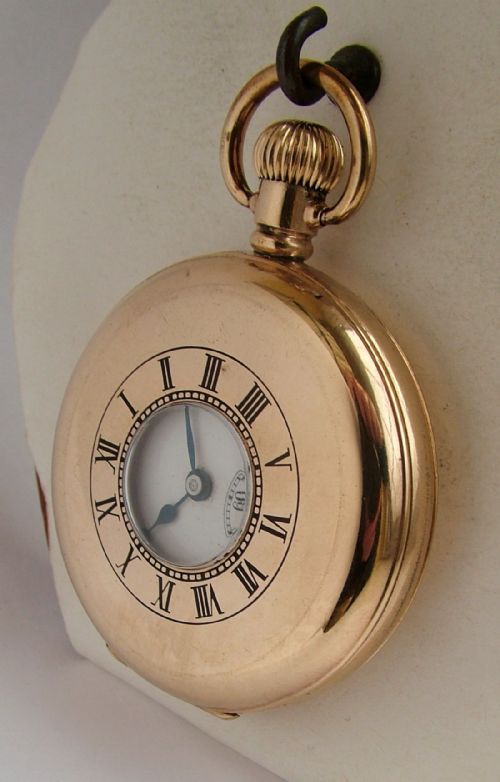 fig 1. A 1920s Advance half hunter pocket watch