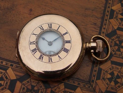 fig 2. An antique Waltham half hunter pocket watch, 1908