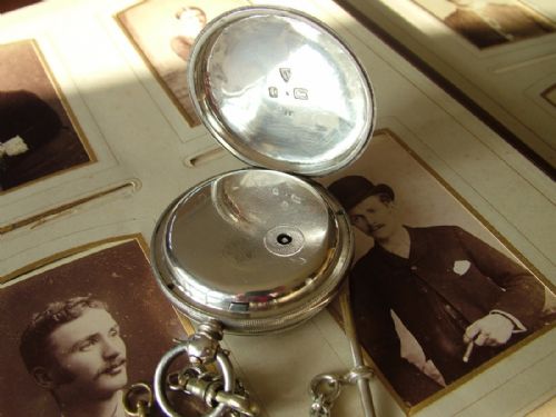 fig 1. An antique silver fusee pocket watch with chain
