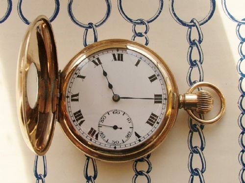 fig 1. A 1920s Record half hunter pocket watch.