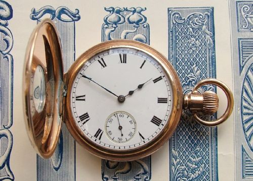 fig 1. Antique 1909 Waltham half hunter pocket watch.