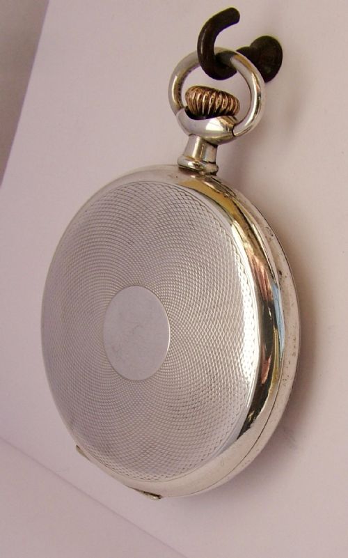 fig 1. A vintage 1920s silver stem winding pocket watch