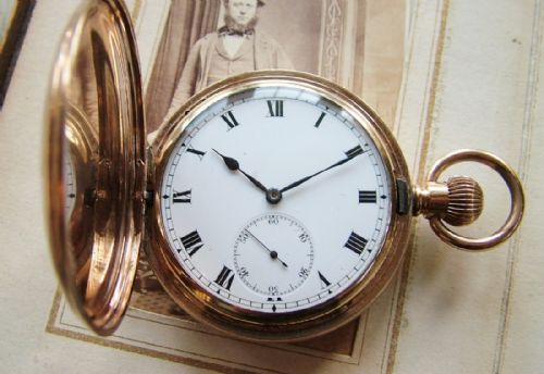 fig 1. An antique full hunter pocket watch