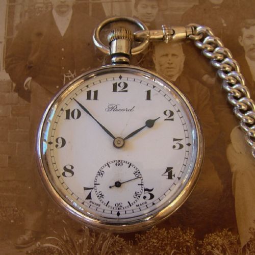 fig 1. 1927 silver Record pocket watch and silver albert.