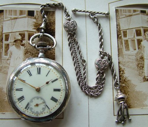 An Antique Open Faced Pocket Watch and Albertina